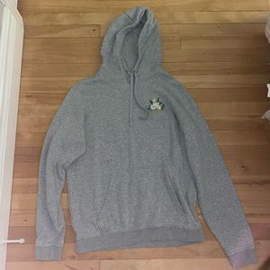 Medium grey Nike sweatshirt with flowers embroidered around the Nike logo.